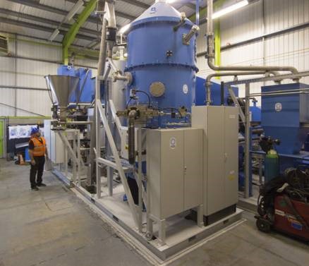 The RT7000 unit which produces Plaxx from mixed rigid plastic