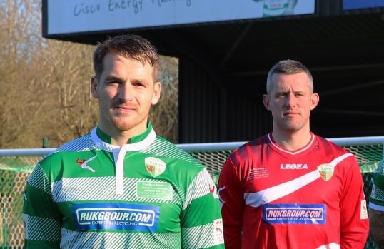 (l-r) TNS' left back Chris Marriott and goalkeeper Paul Harrison in shirts sponsored by RWUK Group