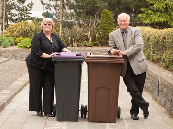 (L-R) Aberdeen councillors Jean Morrison with the proposed residual waste bin and Neil Cooney with the larger recycling bin