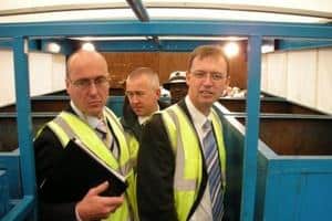 Guests to AbitibiBowater's Recycling in Action day inspect the stillage vehicle used in Nuneaton and Bedworth