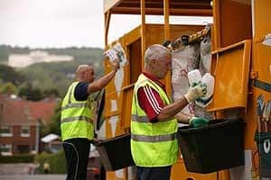 Bryson's recycling trucks with seperate compartments for each material