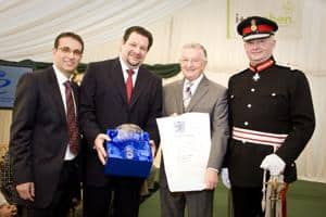 (from left to right) Philip Geller (financial director), Elliot Cohen (chief executive), Gerald Cohen (founder), Lord Lieutenant of Greater Manchester, Warren Smith