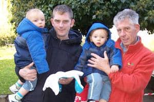 Southwark resident Geoff Foster (right) with son Mark, who has switched grandsons Frankie and Freddie to real nappies