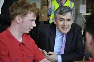 Prime Minister Gordon Brown talks to apprentices at Aylesford Newsprint in Kent on one of his first stops on the General Election campaign trail