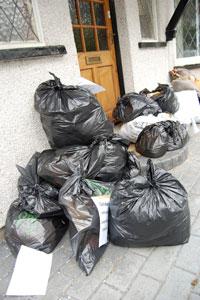 Fourteen bags of waste were left at Cllr Brett's home in a sign of solidarity with striking workers