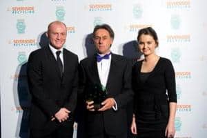 Neil Boucher, head of development at MPG Books (centre) receives the letsrecycle.com award from Caelia Quinault, news editor of letsrecycle.com (right) and Welsh international rugby player Martyn Williams