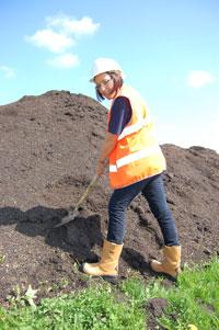 Lindsey Skelton, site manager at Yorwaste's Tancred facility, with some of the PAS-100 accredited compost