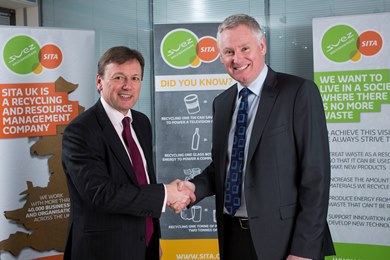 (L-R) Charles Hammond, Forth Ports Group chief executive concludes the acquisition deal with SITA UK chief executive David Palmer-Jones
