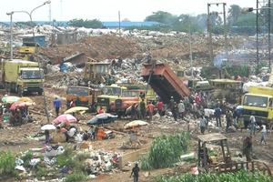 Hundred of people in Nigeria make their living looking for precious metal components within e-waste