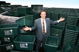 Council leader Paul Lorber with the new green boxes to be used in the compulsory scheme
