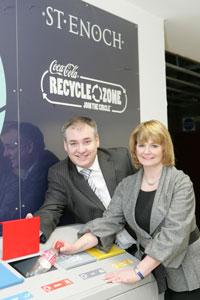 Scottish environment secretary Richard Lochhead and Susan Nichol of the St Enochs Centre make use of the recycle zone facilities in Glasgow