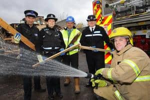 Fireman Paul Simpson from Tyne and Wear Fire and Rescue Service (front) and (l to r) CSO Paul Mawson and PC Carly Zawodzinski from Northumbria Police, Lee Lowden, business manager at SITA UK's North Tyneside Waste Transfer Station and Inspector Pam Bridges from Northumbria Police