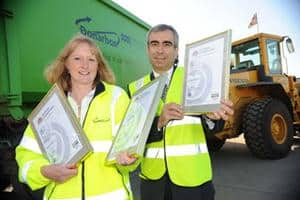 Sarah Clover, business development director for Donarbon with Colin Rushmere, team manager at BSI Management Systems, and the three certificates