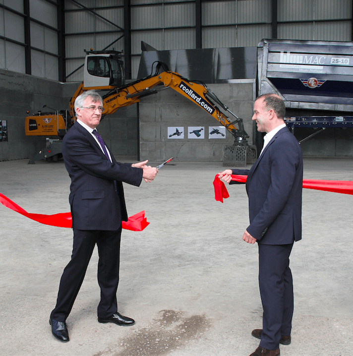 (l-r) MP Sir Gerald Howarth cuts the ribbon with Robert Collard, managing director of the waste and demolition firm