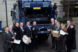 Members of WISH celebrate signing the charter to cut accidents in the waste management sector by 10% each year for the next five years