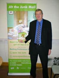 Cllr Anthony Blagg, cabinet member for waste and green environment, by part of the Jilt the Junk Mail stand