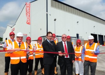 Remondis is developing its activities in the UK which includes work in the hazardous waste sector and organics. The organics side includes ReFood and the development of the PDM business. Pictured is the ribbon-cutting ceremony at its new hazardous waste transfer station at Prescot with (l-r) joint managing directors Marcus Bauer and David Winstanley