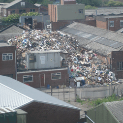 Waste piled high at 'The Yard' in Oldbury, which has since been removed