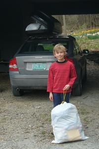A member of the Walker family with one of their rare bags of residual waste