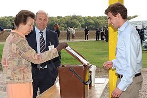 Her Royal Highness looks at a kitchen caddy as she visits the Twinwoods plant, pictured here with Biogen chairman John Ibbett (left) and technical development assistant Peter Ibbett (right)