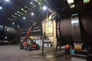 Compost is loaded into a pasteurising vessel for final sanitisation at New Earth's Sharpness facility in Gloucestershire