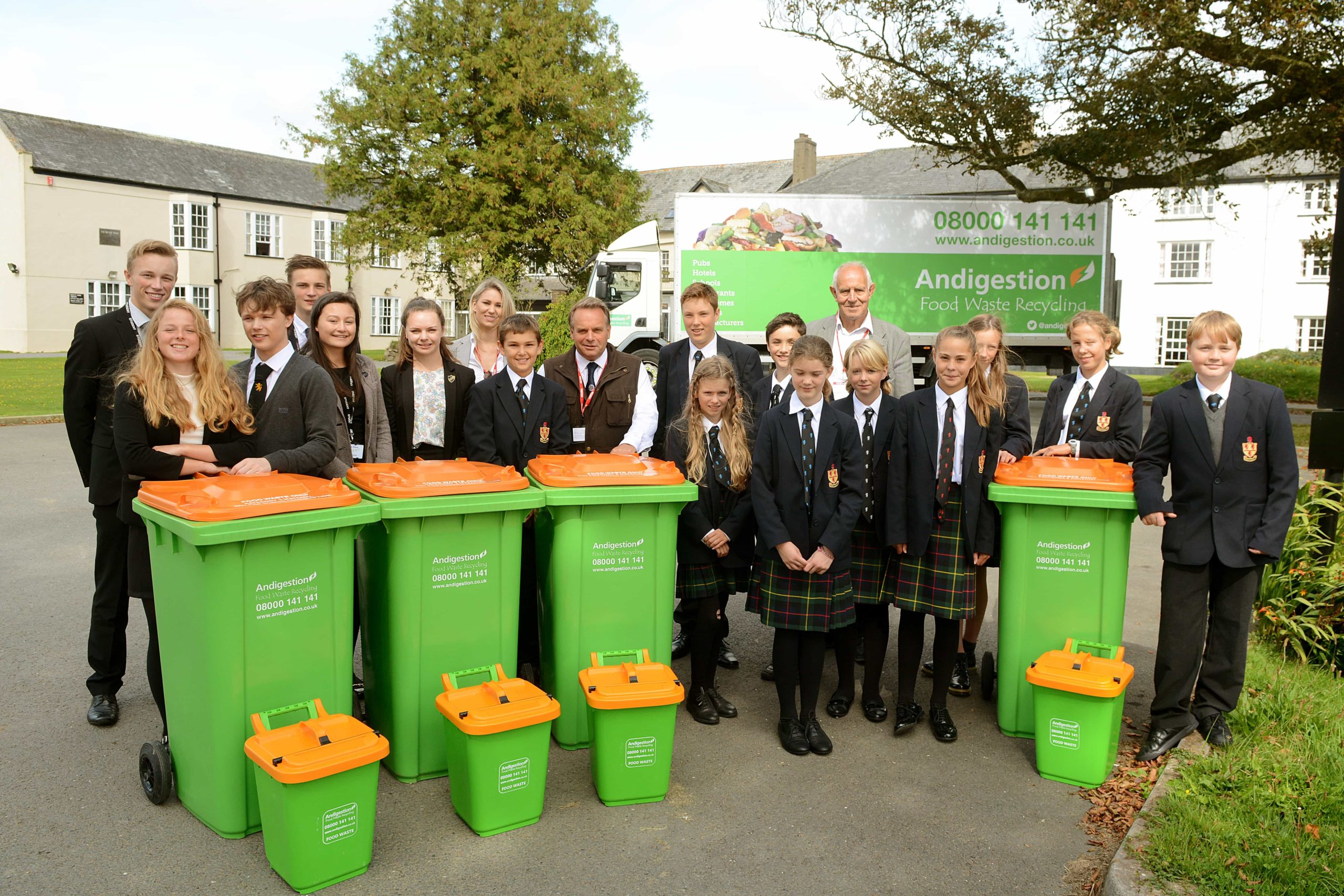 Business Development manager Carly Kilby, chairman Peter Prior, MP Neil Parish and students from Shebbear College