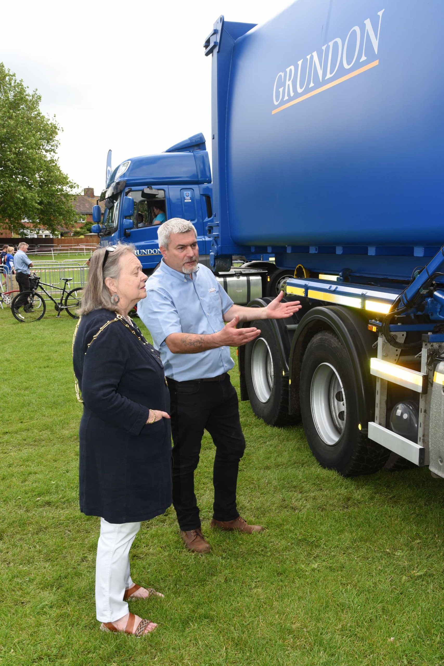 Grundon's Peter Kent explains vehicle safety features to councillor Rosslyn Lester