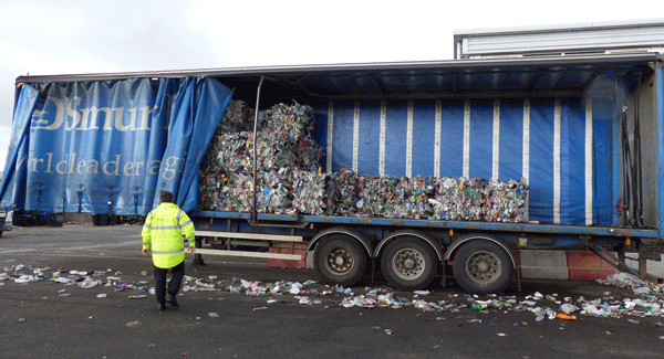 Recyclable materials are baled at the depot and sent on to reprocessors