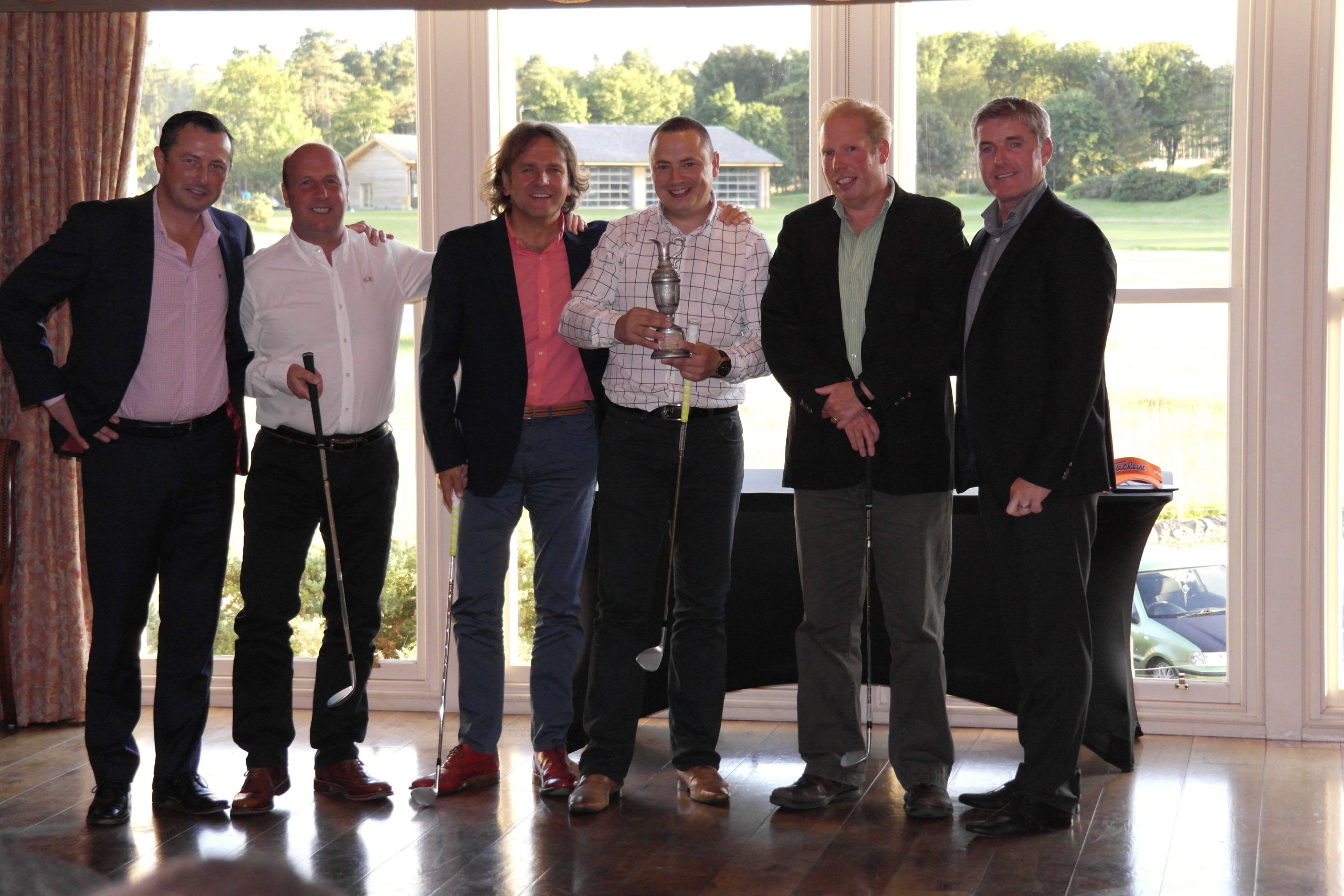 The four-man team from Nathan's Wastesavers collect their trophy after having been crowned champions of the Masters of Waste Scotland 2015
