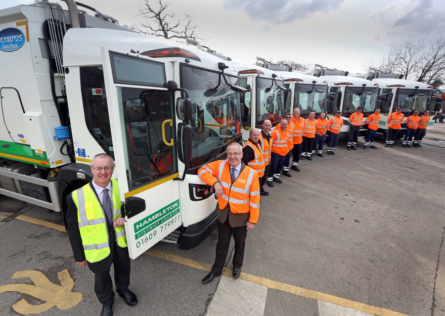 Hambleton council leader Mark Robson and environmental services portfolio holder Brian Phillips show with the collection crew and new recycling fleet
