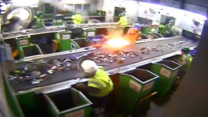 An image taken from CCTV footage showing a lithium-ion battery exploding on a sorting line in a Materials Recycling Facility in the UK.