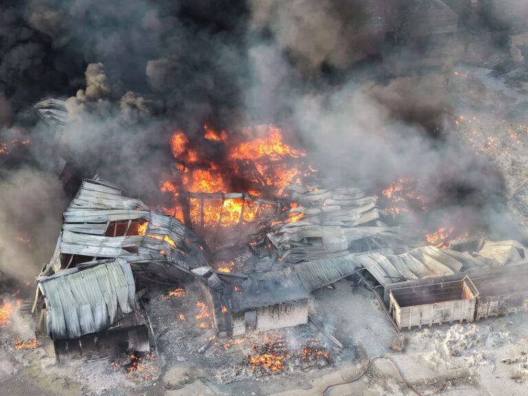Cardboard fire at Widnes waste site sees 20 engines deployed